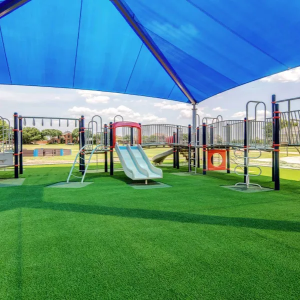 Outdoor Kids play area with artificial Grass