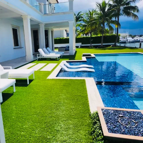 Hotel pool around artificial grass