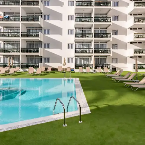 Hotel Poolside Artificial Grass installation completed with seamless turf layout around pool decks