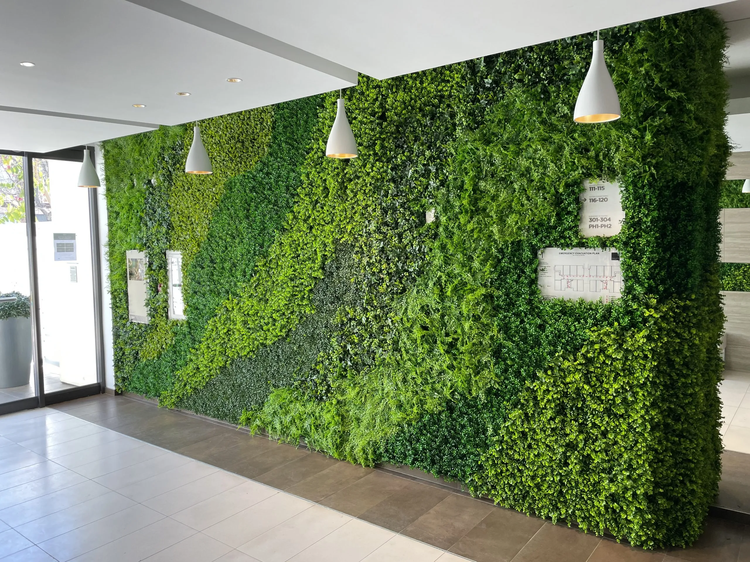 Artificial Wall Grass vs Natural Green Walls
