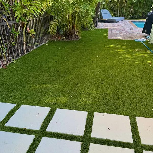 Artificial grass installation in a Dubai Hills garden