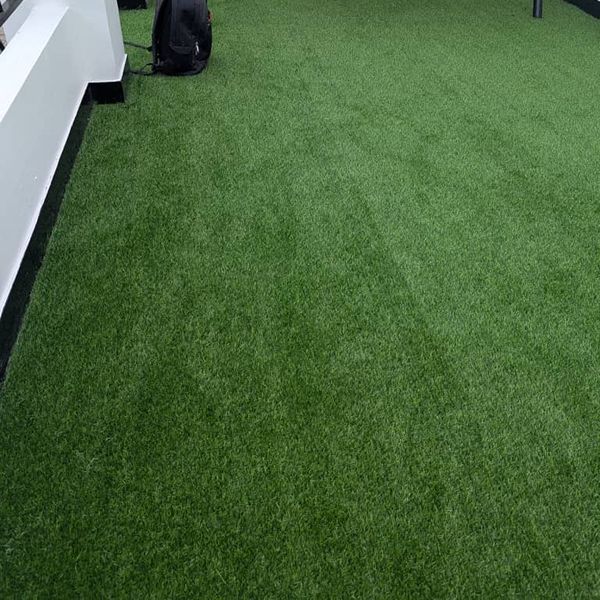 Artificial grass flooring installed in a Dubai Hills residential yard