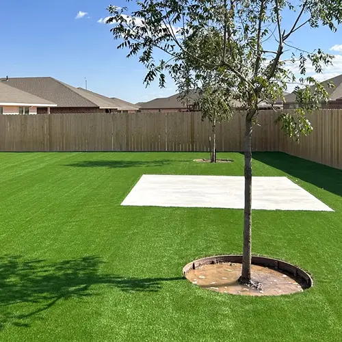 Artificial grass installation in a residential backyard in Business Bay Dubai